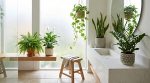 Modern, well-lit bathroom with lush green houseplants: fern, peace lily, pothos, snake plant, ZZ plant. Serene, natural ambiance.