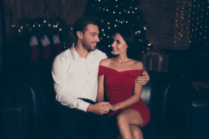 elegant-couple-sitting-couch (1)