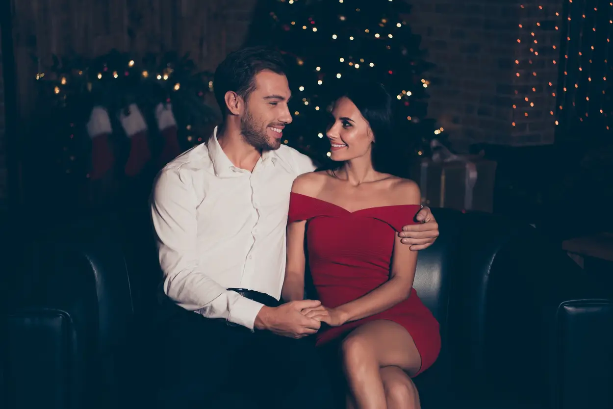 elegant-couple-sitting-couch (1)